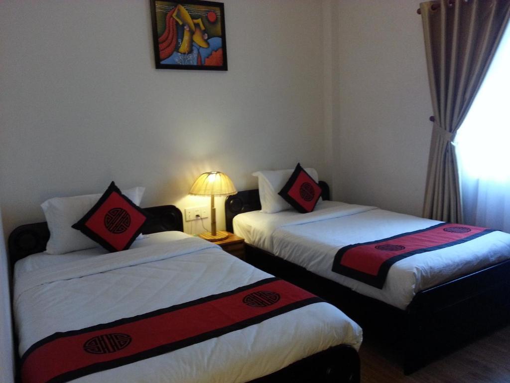 Pink Tulip Hotel TP. Hồ Chí Minh Phòng bức ảnh
